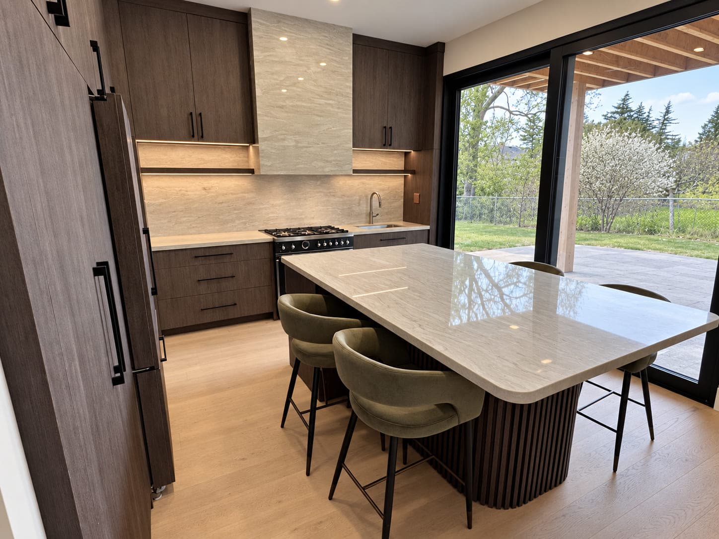 Pale stone kitchen island and backsplash with warm wood cabinetry